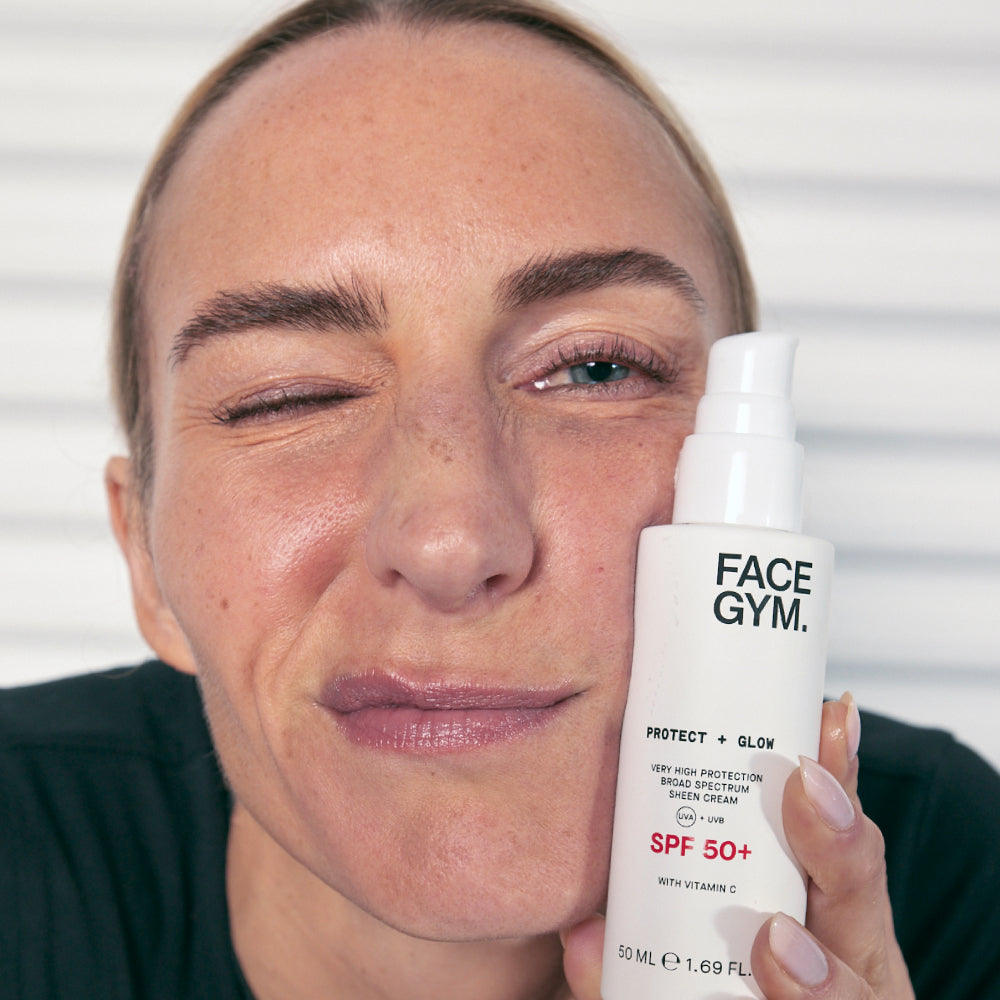 Facegym model holding the SPF Moisturiser