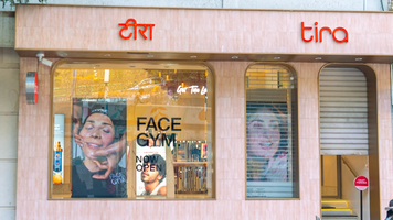 a store front with a sign on the window