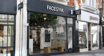 a store front with a sign on the front